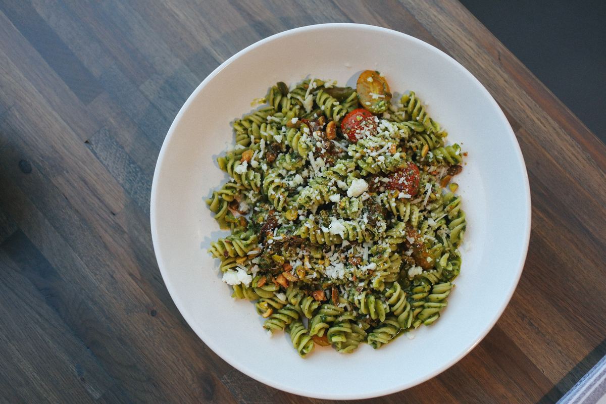 Green pasta dish at Amici